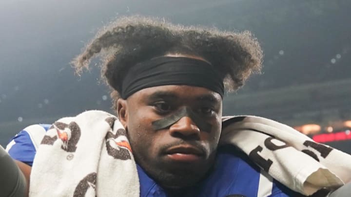 Indianapolis Colts cornerback Kenny Moore II walks off the field
