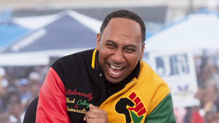 ESPN analyst Stephen A. Smith, left and College GameDay personality Keith Herbstreit, right, on set in Jackson, Miss.