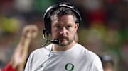 Oct 18, 2025; Piscataway, New Jersey, USA;  Oregon Ducks head coach Dan Lanning looks on during the first half against the Rutgers Scarlet Knights at SHI Stadium. Mandatory Credit: Vincent Carchietta-Imagn Images