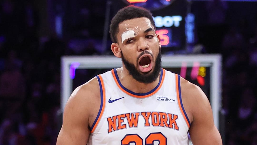 Feb 4, 2026; New York, New York, USA;  New York Knicks center Karl-Anthony Towns (32) celebrates in the fourth quarter against the Denver Nuggets at Madison Square Garden.