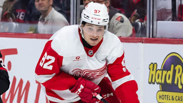Mar 10, 2025; Ottawa, Ontario, CAN; Ottawa Senators defenseman Thomas Chabot (72) chases Detroit Red Wings center Marco Kasper (92) who controls the puck in the second period at the Canadian Tire Centre. Mandatory Credit: Marc DesRosiers-Imagn Images