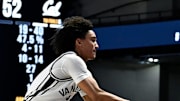Vanderbilt guard Tyler Tanner (3) saves the ball from going out of bounds during an NCAA college basketball game against California Wednesday, Nov. 13, 2024, in Nashville, Tenn.
