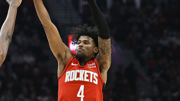 Apr 12, 2024; Portland, Oregon, USA; Houston Rockets guard Jalen Green (4) shoots a jump shot during the first half against Portland Trail Blazers forward Jabari Walker (34) at Moda Center. Mandatory Credit: Troy Wayrynen-Imagn Images