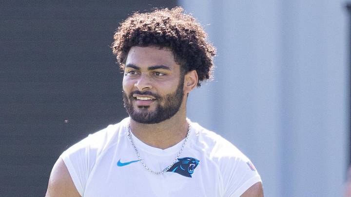Carolina Panthers tight end Tommy Tremble works out on the sidelines during training camp. 