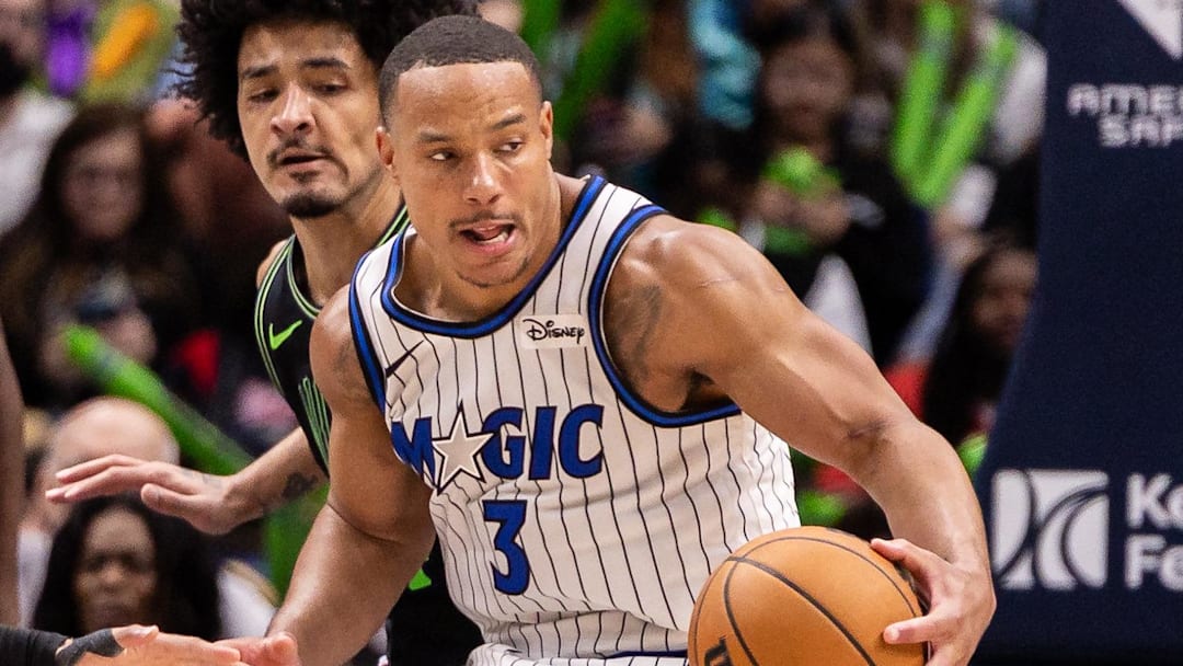Apr 5, 2026; New Orleans, Louisiana, USA;  Orlando Magic guard Desmond Bane (3) dribbles against New Orleans Pelicans guard Jeremiah Fears (0) and center Yves Missi (21) during the second half at Smoothie King Center. Mandatory Credit: Stephen Lew-Imagn Images