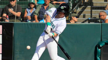 Outfielder (13)  Ethan O'Donnell makes a home run