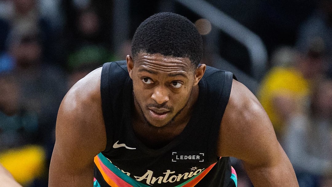 Jan 2, 2026; Indianapolis, Indiana, USA;  San Antonio Spurs guard De'Aaron Fox (4) dribbles the ball while Indiana Pacers guard Ben Sheppard (26) defends in the second half at Gainbridge Fieldhouse. Mandatory Credit: Trevor Ruszkowski-Imagn Images
