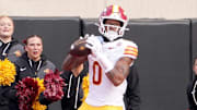 Iowa State's Chase Sowell (0) scores a touchdown as Oklahoma State's Eric Fletcher (13) defends in the first half of the college football game between the Oklahoma State Cowboys and the Iowa State Cyclones at Boone Pickens Stadium in Stillwater, Okla., Saturday Nov. 29, 2025.