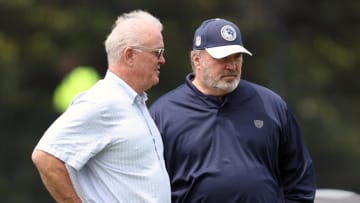 Jun 4, 2024; Frisco, TX, USA;  Dallas Cowboys CEO Stephen Jones (L) talks with head coach Mike McCarthy (R) during practice at the Ford Center at the Star Training Facility in Frisco, Texas. Mandatory Credit: Tim Heitman-USA TODAY Sports