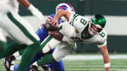 Buffalo Bills defensive end Leonard Floyd (56) sacks New York Jets quarterback Aaron Rodgers (8) early in the first quarter during the home opener at MetLife Stadium on Monday, Sept. 11, 2023, in East Rutherford. Rodgers was carted off the field after being hit.