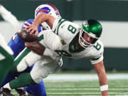 Buffalo Bills defensive end Leonard Floyd (56) sacks New York Jets quarterback Aaron Rodgers (8) early in the first quarter during the home opener at MetLife Stadium on Monday, Sept. 11, 2023, in East Rutherford. Rodgers was carted off the field after being hit.