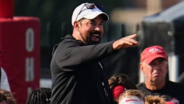Ohio State Buckeyes head coach Ryan Day addresses the team during football training camp.