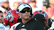 Sep 20, 2025; Durham, North Carolina, USA;  NC State Wolfpack head coach Dave Doeren during the second quarter against the Duke Blue Devils at Wallace Wade Stadium. Mandatory Credit: Zachary Taft-Imagn Images