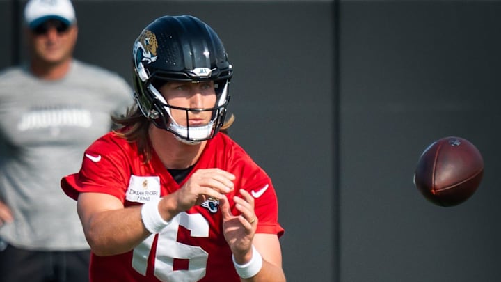 Jacksonville Jaguars quarterback Trevor Lawrence (16) rolls out to catch a snap during a drill during the seventh organized team activity at the Miller Electric Center in Jacksonville, Fla. Monday, June 2, 2025. [Doug Engle/Florida Times-Union]