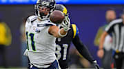Nov 16, 2025; Inglewood, California, USA; Seattle Seahawks wide receiver Jaxon Smith-Njigba (11) makes a one handed catch against Los Angeles Rams cornerback Darious Williams (31) during the first half at SoFi Stadium. 