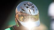 Lindsey Nelson Stadium is reflected in a Notre Dame player's helmet during game two of the NCAA Baseball Tournament Knoxville Super Regional between the Tennessee Volunteers and the Notre Dame Irish held at Lindsey Nelson Stadium on Saturday, June 11, 2022