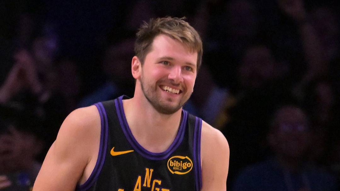 Mar 31, 2026; Los Angeles, California, USA;  Los Angeles Lakers guard Luka Doncic (77) smiles after a dunk in the final minutes of the game against the Cleveland Cavaliers at Crypto.com Arena. Mandatory Credit: Jayne Kamin-Oncea-Imagn Images