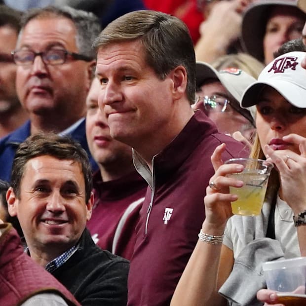 The Sports Director of Texas A & M Aggies, Trev Alberts, looks in the first half against the Houston Cougars.