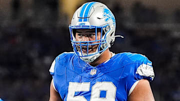 Detroit Lions offensive tackle Giovanni Manu (59) gets into position before a play against the Pittsburgh Steelers during the first half of a preseason game at Ford Field in Detroit on Saturday, August 24, 2024.