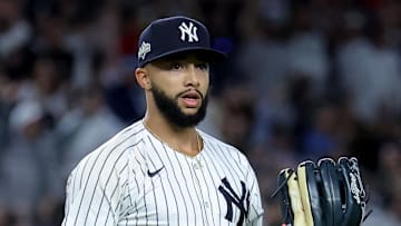Oct 1, 2025; Bronx, New York, USA; New York Yankees relief pitcher Devin Williams (38) reacts during the eighth inning of game two of the Wildcard round of the 2025 MLB playoffs against the Boston Red Sox at Yankee Stadium. Mandatory Credit: Brad Penner-Imagn Images