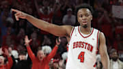 Feb 22, 2025; Houston, Texas, USA;  Houston Cougars guard L.J. Cryer (4) reacts to guard Milos Uzan (7) (not pictured) three point basket against the Iowa State Cyclones in the first half at Fertitta Center. Mandatory Credit: Thomas Shea-Imagn Images