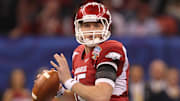 Arkansas Razorbacks quarterback Ryan Mallett (7) throws in the pocket against the Ohio State Buckeyes  during the 2011 Sugar Bowl at the Louisiana Superdome.