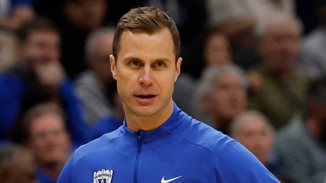Mar 29, 2026; Washington, DC, USA; Duke Blue Devils head coach Jon Scheyer looks on against the UConn Huskies in the first half during an Elite Eight game of the East Regional of the men's 2026 NCAA Tournament at Capital One Arena. Mandatory Credit: Geoff Burke-Imagn Images