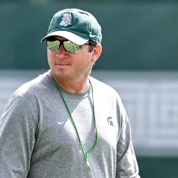 Michigan State's head coach Jonathan Smith watches over the action during the first day of football camp on Tuesday, July 30, 2024, in East Lansing.