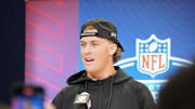 Mississippi quarterback Jaxson Dart speaks to the media at the 2025 NFL combine.