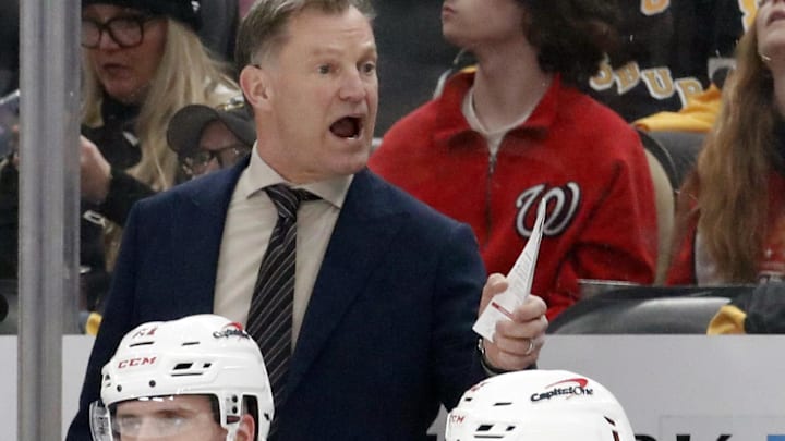 Mar 7, 2024; Pittsburgh, Pennsylvania, USA; Washington Capitals assistant coach Kirk Muller (rear) yells out instructions against the Pittsburgh Penguins during the first period at PPG Paints Arena. Kirk Muller  Mandatory Credit: Charles LeClaire-Imagn Images