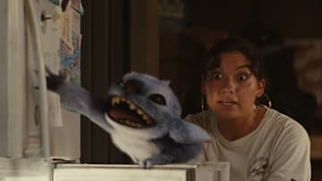 (L-R) Stitch and Sydney Agudong as Nani in Disney’s live-action LILO & STITCH. Photo courtesy of Disney. © 2025 Disney Enterprises Inc. All Rights Reserved.