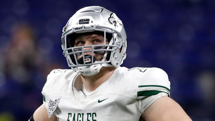 Zionsville's Joey Tanona (79) looks up at the scoreboard during the second half of a state final game Friday, Nov. 26, 2021, at Lucas Oil Stadium. The Cathedral Fighting Irish defeated the Zionsville Eagles 34-14.