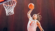 Illinois guard Dra Gibbs-Lawhorn (2) elevates for a dunk in the Illini's 87-79 win over Ohio State on Sunday at the State Farm Center in Champaign, Illinois.