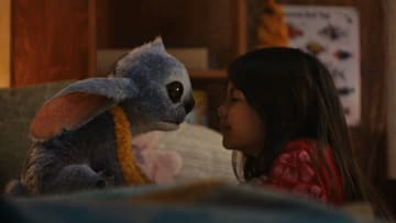 (L-R) Stitch and Maia Kealoha as Lilo in Disney’s live-action LILO & STITCH. Photo courtesy of Disney. © 2025 Disney Enterprises Inc. All Rights Reserved.