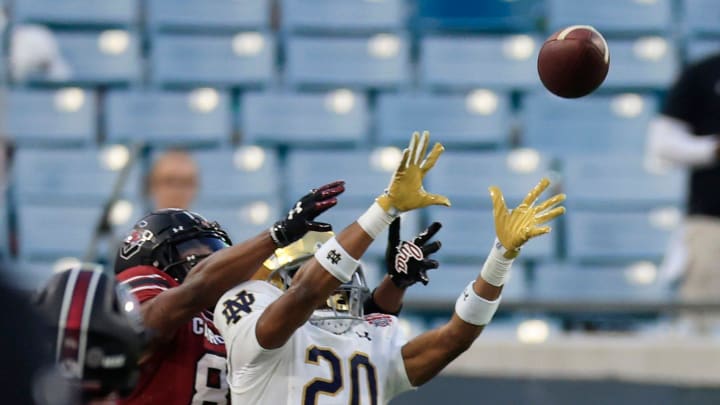 Notre Dame Fighting Irish cornerback Benjamin Morrison (20) tallies an interception during the second quarter of the TaxSlayer Gator Bowl of an NCAA college football game Friday, Dec. 30, 2022 at TIAA Bank Field in Jacksonville. The Notre Dame Fighting Irish held off the South Carolina Gamecocks 45-38. 