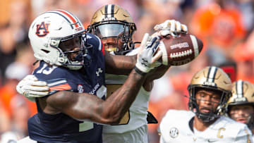Vanderbilt Commodores defensive back Martel Hight (25) breaks up a pass intend for Auburn Tigers tight end Rivaldo Fairweather (13) as Auburn Tigers take on Vanderbilt Commodores at Jordan-Hare Stadium in Auburn, Ala., on Saturday, Nov. 2, 2024. Vanderbilt Commodores defeated Auburn Tigers 17-7.