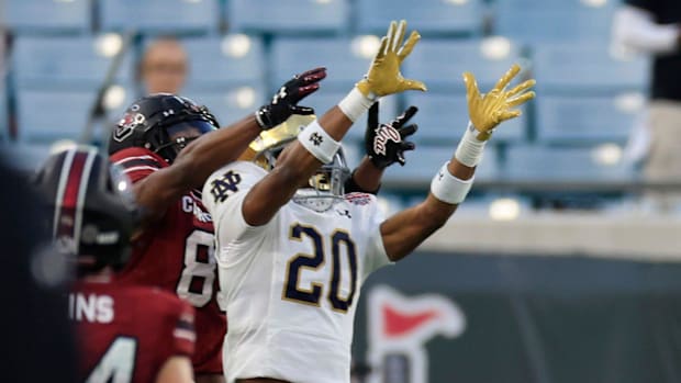 Benjamin Morrison makes a play on the ball in the 2022 Gator Bowl