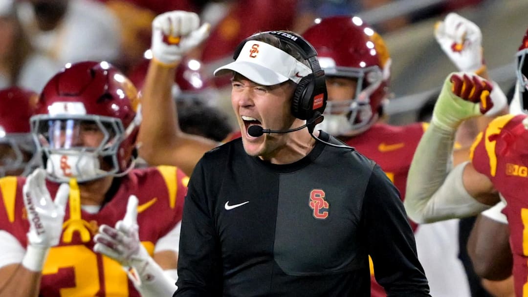 Oct 11, 2025; Los Angeles, California, USA;  USC Trojans head coach Lincoln Riley celebrates after kicker Ryon Sayeri (48) hit a 54-yard field goal in the second half against the Michigan Wolverines at United Airlines Field at the Los Angeles Memorial Coliseum. 