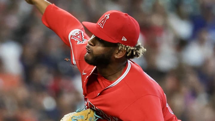 Mar 26, 2026; Houston, Texas, USA;  Los Angeles Angels pitcher Walbert Urena (57) pitches against the Houston Astros in the seventh inning at Daikin Park. Mandatory Credit: Thomas Shea-Imagn Images
