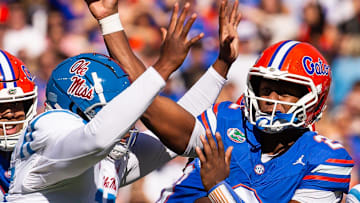 Mississippi Rebels defensive end Jared Ivey (15) pressures Florida Gators quarterback DJ Lagway (2) during the first half at Ben Hill Griffin Stadium in Gainesville, FL on Saturday, November 23, 2024. [Doug Engle/Gainesville Sun]