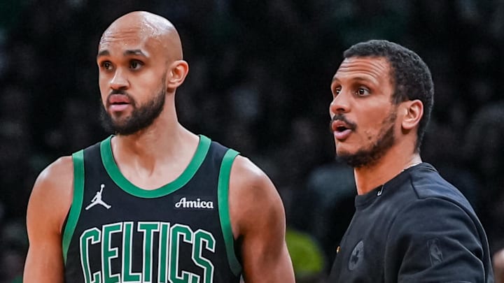 Apr 28, 2026; Boston, Massachusetts, USA; Boston Celtics head coach Joe Mazzulla talks with guard Derrick White (9) from the sideline as they take on the Philadelphia 76ers during game five of the first round of the 2026 NBA Playoffs at TD Garden. Mandatory Credit: David Butler II-Imagn Images
