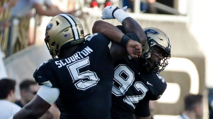 Purdue Boilermakers linebacker Nic Scourton (5) and Purdue Boilermakers defensive lineman Mo Omonode (92) during the NCAA football game against the Illinois Fighting Illini, Saturday, Sept. 30, 2023, at Ross-Ade Stadium in West Lafayette, Ind.