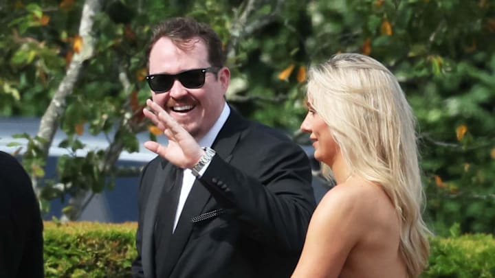 Comedian Shane Gillis waves to the spectators at the Olivia Culpo and Christian McCaffrey wedding.