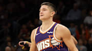 Nov 10, 2025; Phoenix, Arizona, USA; Phoenix Suns guard Grayson Allen (8) shoots a three pointer against the New Orleans Pelicans in the second half at the Mortgage Matchup Center. Mandatory Credit: Mark J. Rebilas-Imagn Images