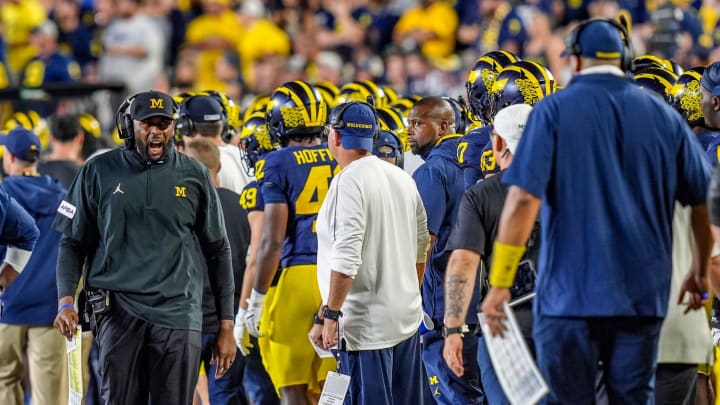 Michigan head coach Sherrone Moore yells out from the sidelines after multiple flags are thrown against Fresno State during the second half at Michigan Stadium in Ann Arbor on Saturday, Aug. 31, 2024.