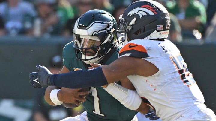Philadelphia Eagles quarterback Jalen Hurts (1) is sacked by Denver Broncos linebacker Nik Bonitto on Sunday.