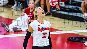 Andi Jackson celebrates a kill in the first set.