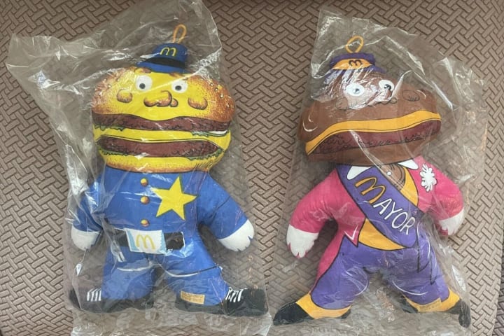 McDonald's plush toys, including Mayor McCheese and Officer Big Mac