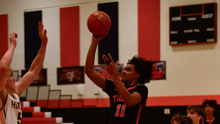 St. Cloud Tech boys basketball senior Yusupha Badji shoots a floater during a game Dec. 28, 2024 against Hutchinson at Tech High School. The Tigers lost 50-47. St. Cloud Tech boys basketball senior Yusupha Badji shoots a floater during a game Dec. 28, 2024 against Hutchinson at Tech High School. The Tigers lost 50-47.