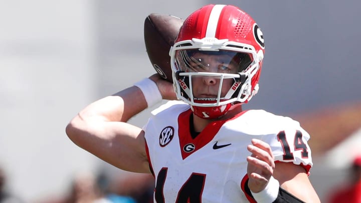 Georgia quarterback Gunner Stockton (14) throws a pass during the G-Day spring football game in Athens, Ga., on Saturday, April 13, 2024.